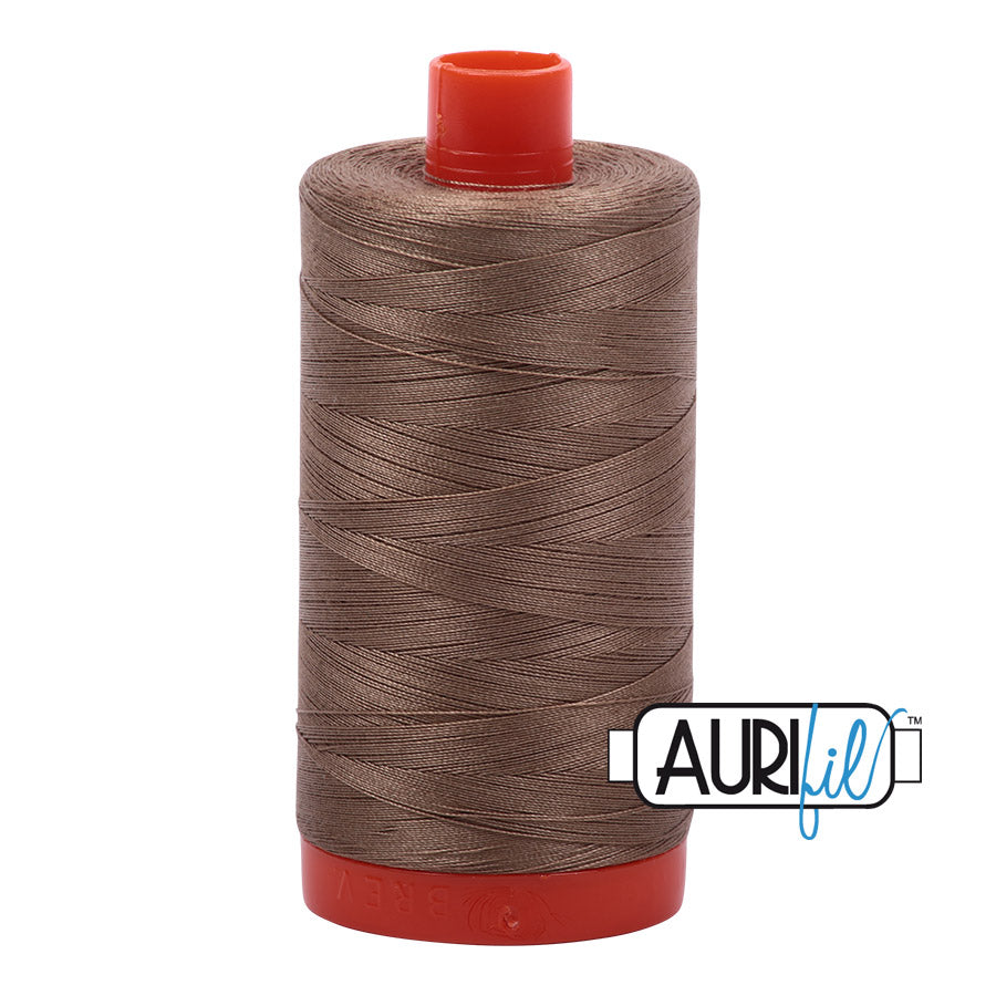Aurifil 50 wt. cotton thread offers versatility, strength, and radiant color with very little lint on each 1,422 yard large spool.