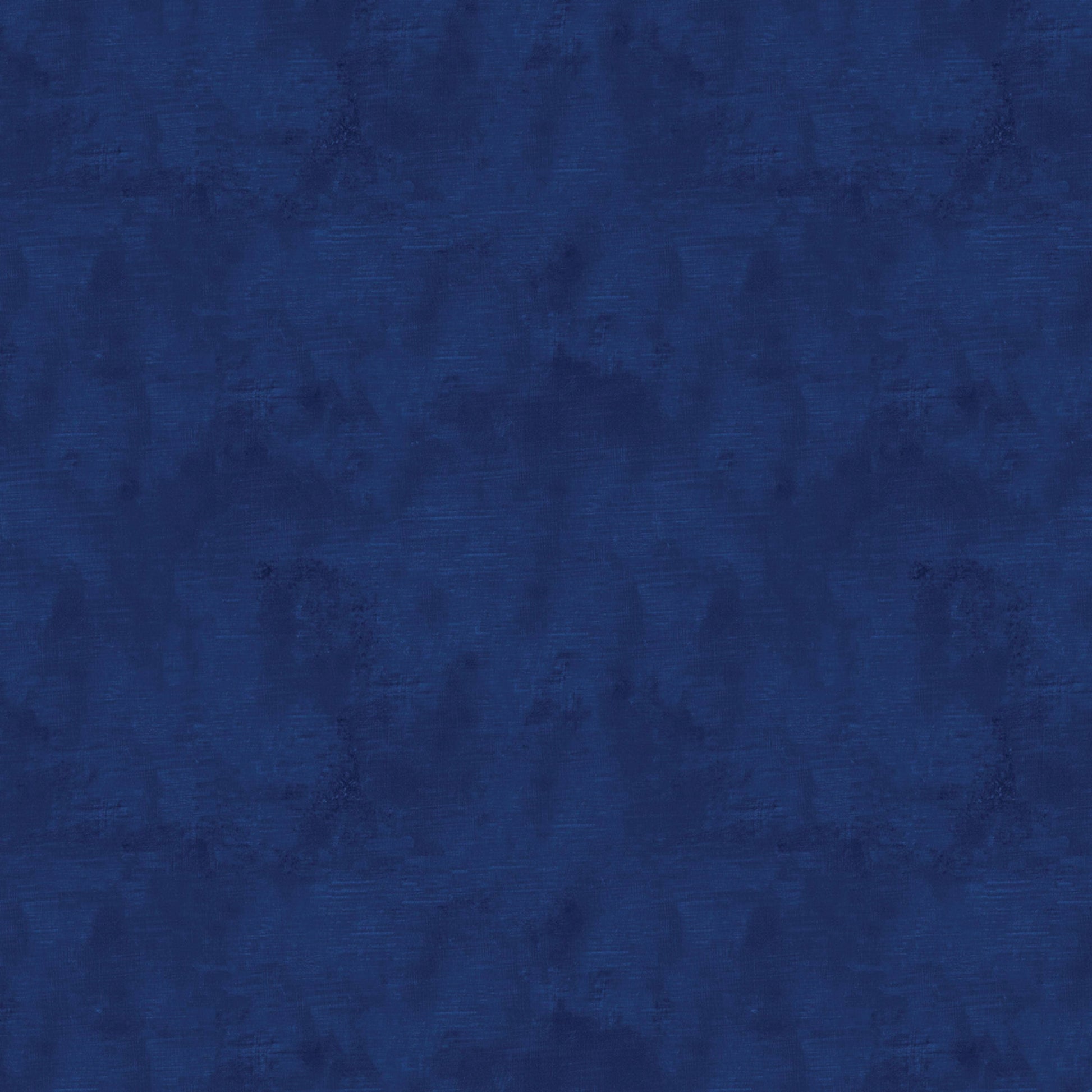 Chalk Texture 9488-57 is a navy blue cotton fabric with a mottled tone on tone texture with lightly brushed markings.