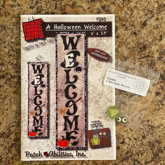 Add a spooky touch to your home with the Halloween Welcome with Buttons (P249B) by PatchAbilities! With a frog, spider, pumpkin, and broom, this fun and easy project is sure to get all the frightful fun of Halloween. Photo shows the front of the pattern with included frog and eyeball buttons.