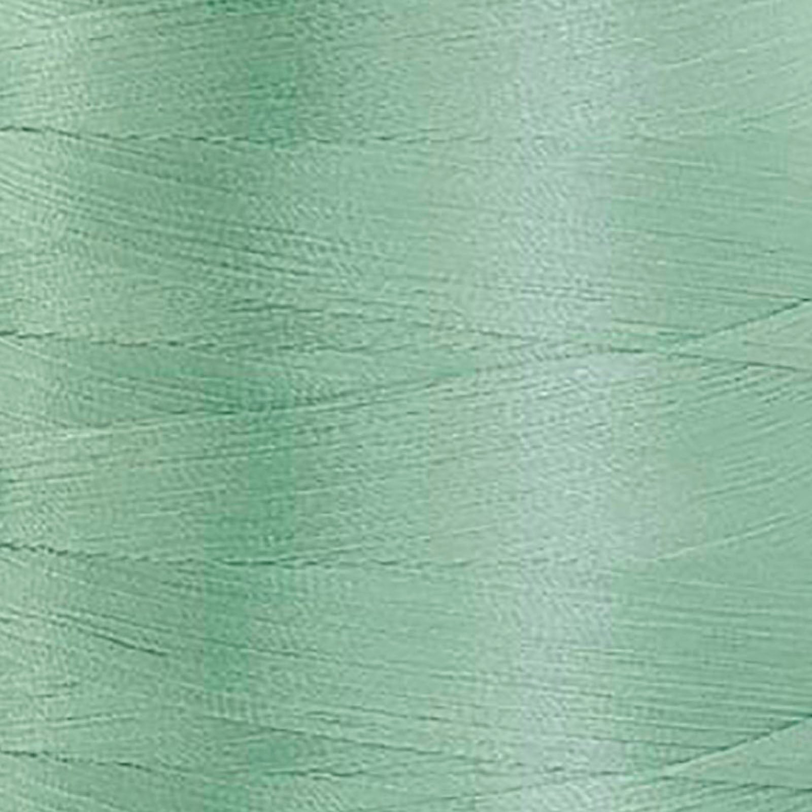 Glide trilobal polyester 40 wt. thread in Magic Mint - -30317; Photo shows mint green closeup of thread wrapped on spool of thread.