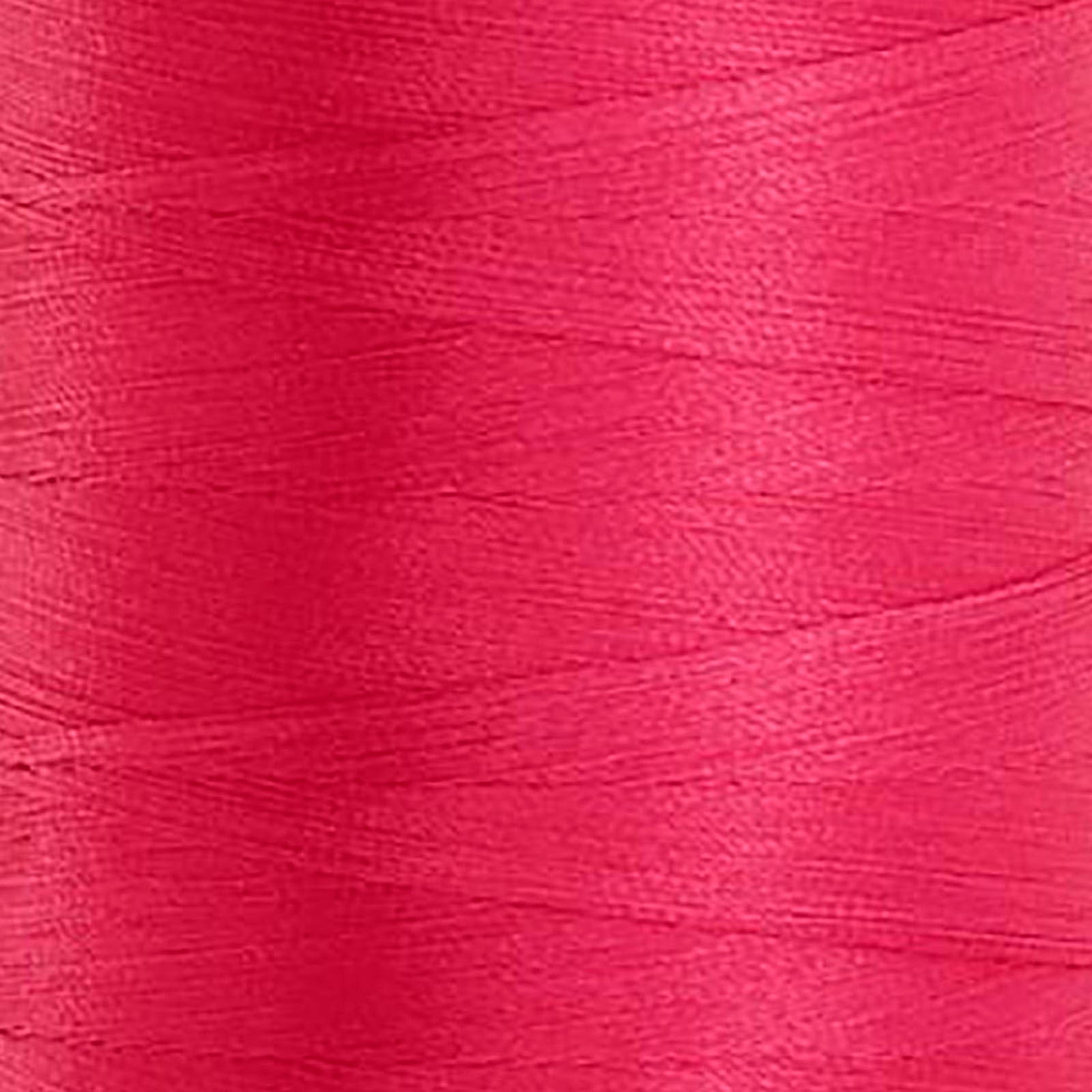 Glide Trilobal Polyester 40 wt thread in Hot Pink - 70812 - Photo shows close up detail of pink thread wound on the spool