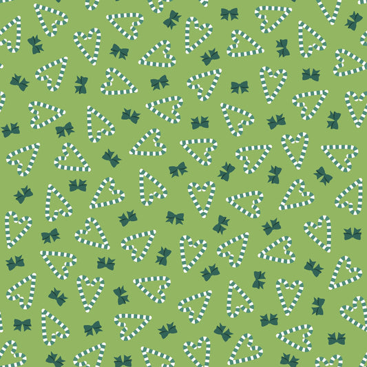 The Candy Cane Hearts print from the A Quilty Little Christmas line by Kimberbell for Maywood Studio features striped candy canes arranged as a heart and small bows. The Candy Cane Hearts print is available in Green (MAS10578-G) and Red (MAS10578-R) backgrounds.