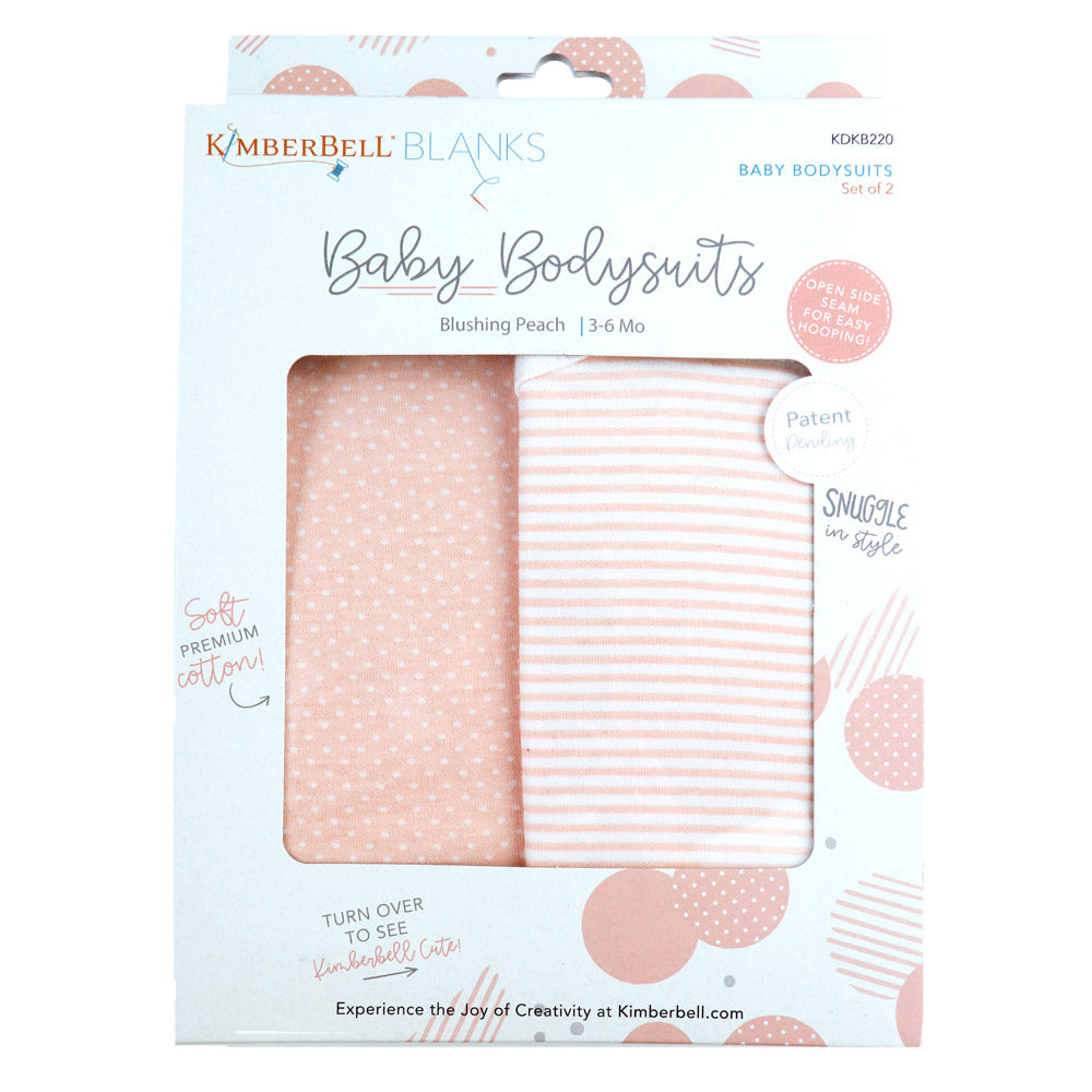 Kimberbell Baby Bodysuits are made with 100% cotton, and are available in 3 sizes of either Blushing Peach or Koala Grey. Photo Shows package of peach bodysuits, one striped and one polka dots.