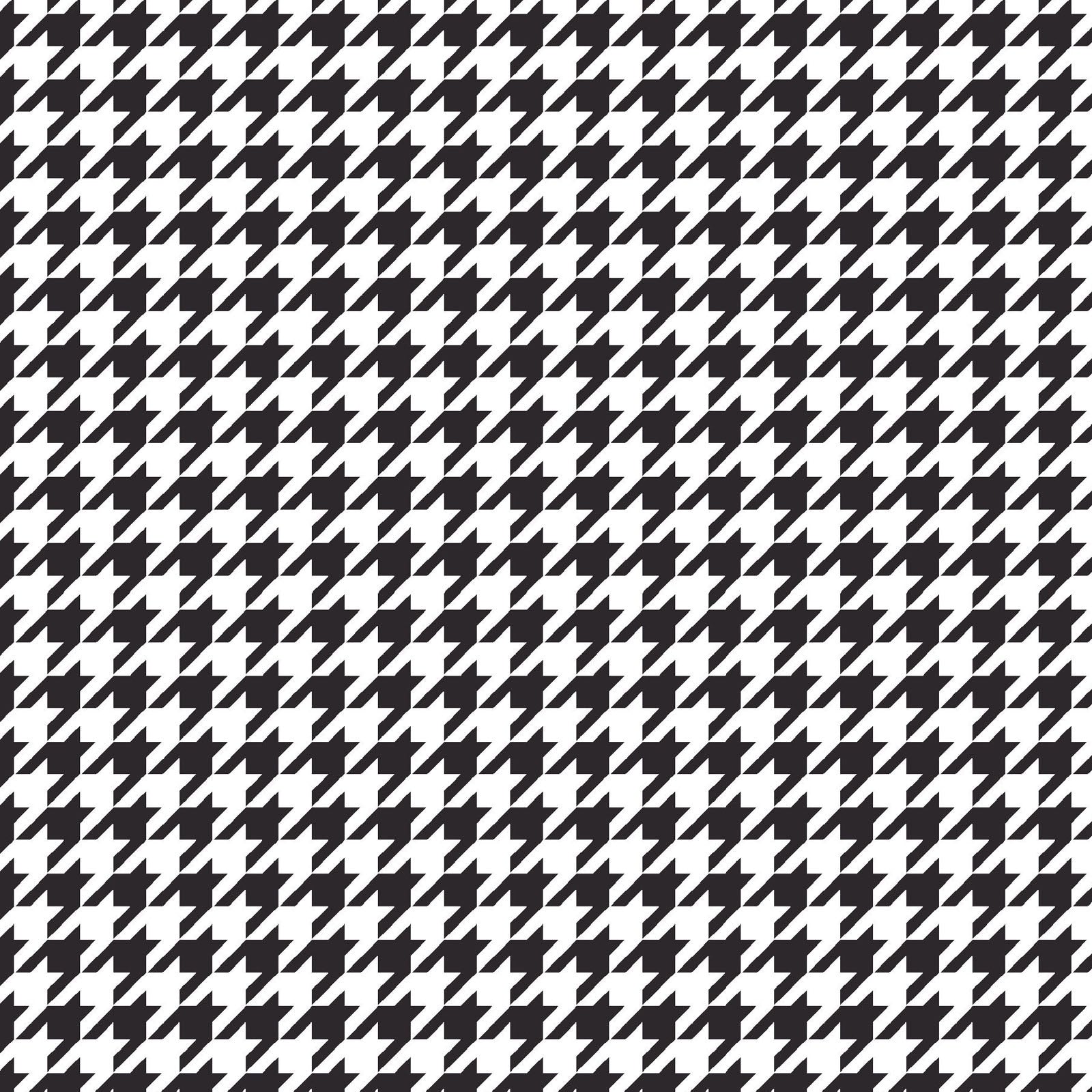 Black on White Houndstooth (MAS8206-J) from the Kimberbell Basics line designed by Kim Christopherson for Maywood Studio. This fabric features a small black houndstooth print on a white background and is a fantastic choice for adding texture and color to a quilt.