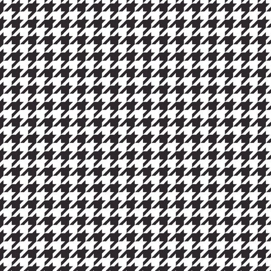 Black on White Houndstooth (MAS8206-J) from the Kimberbell Basics line designed by Kim Christopherson for Maywood Studio. This fabric features a small black houndstooth print on a white background and is a fantastic choice for adding texture and color to a quilt.