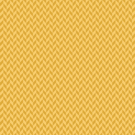 Herringbone in gold (MAS9397-S) is part of the Kimberbell Basics line designed by Kim Christopherson for Maywood Studio. This fabric features a two-tone gold herringbone and adds a sophisticated texture to projects.