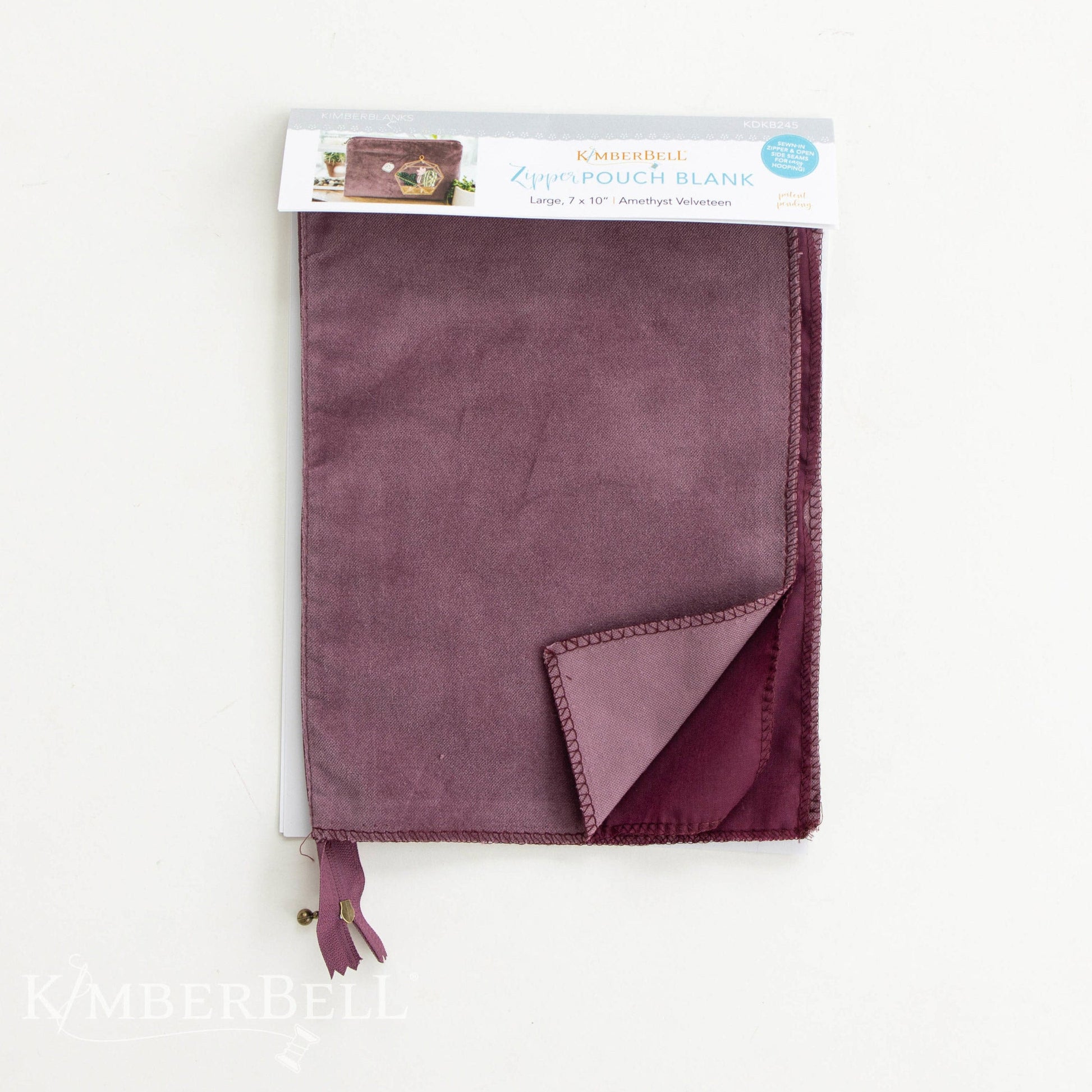 Zipper Pouch Blanks in Amethyst (KDKB245) by Kimberbell have all the beauty and fun of a hand-made pouch, without all of the fuss. The patent pending design features an open side seam to make adding your favorite design easier than ever.  Amethyst is only available in the large (7x10”) size.