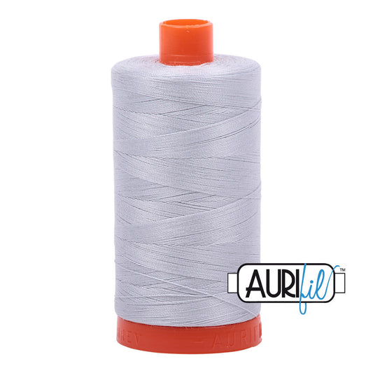 Aurifil 50 wt. cotton thread offers versatility, strength, and radiant color with very little lint on each 1,422 yard large spool.