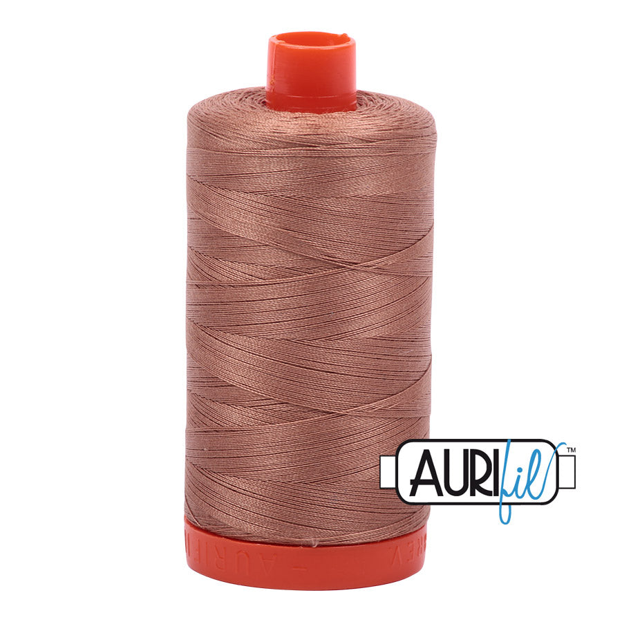 Aurifil 50 wt. cotton thread offers versatility, strength, and radiant color with very little lint on each 1,422 yard large spool.