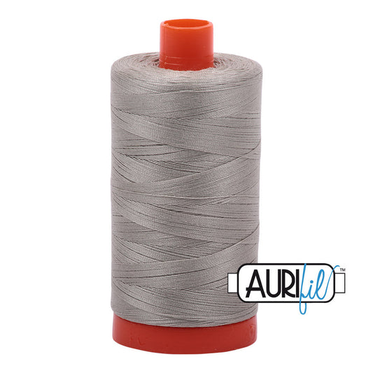 Aurifil 50 wt. cotton thread offers versatility, strength, and radiant color with very little lint on each 1,422 yard large spool.