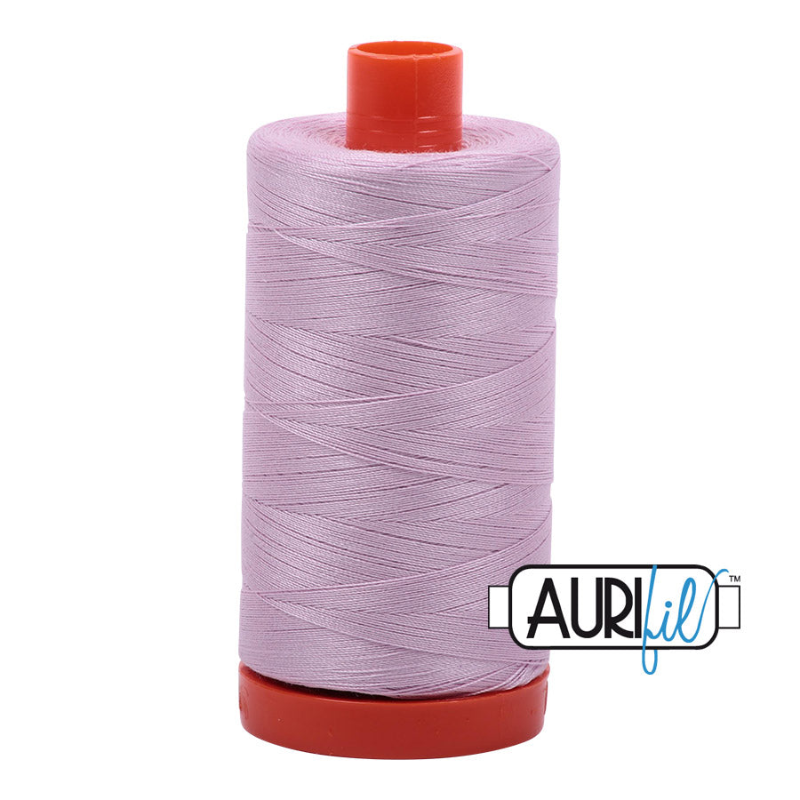 Aurifil 50 wt. cotton thread offers versatility, strength, and radiant color with very little lint on each 1,422 yard large spool.