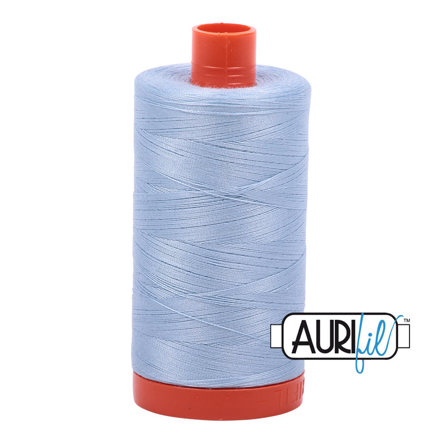 Aurifil 50 wt. cotton thread offers versatility, strength, and radiant color with very little lint on each 1,422 yard large spool.