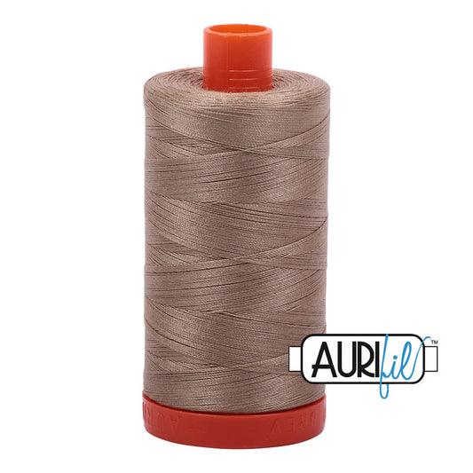 Aurifil 50 wt. cotton thread offers versatility, strength, and radiant color with very little lint on each 1,422 yard large spool.