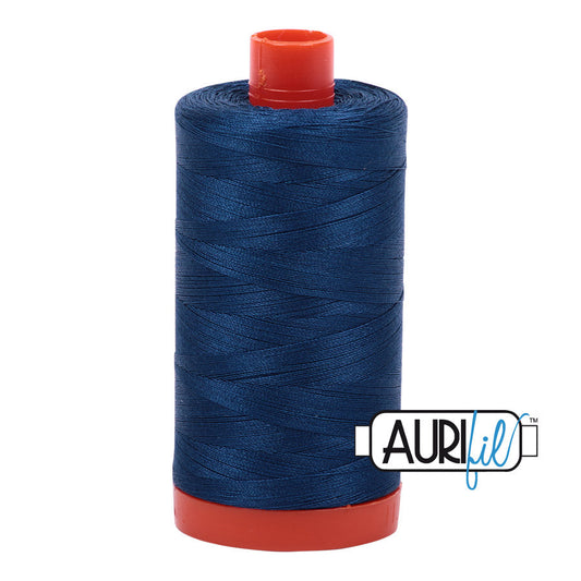 Aurifil 50 wt. cotton thread offers versatility, strength, and radiant color with very little lint on each 1,422 yard large spool.