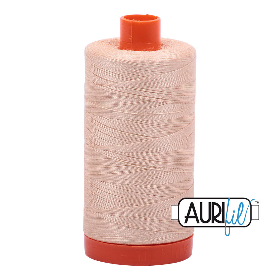 Aurifil 50 wt. cotton thread offers versatility, strength, and radiant color with very little lint on each 1,422 yard large spool.