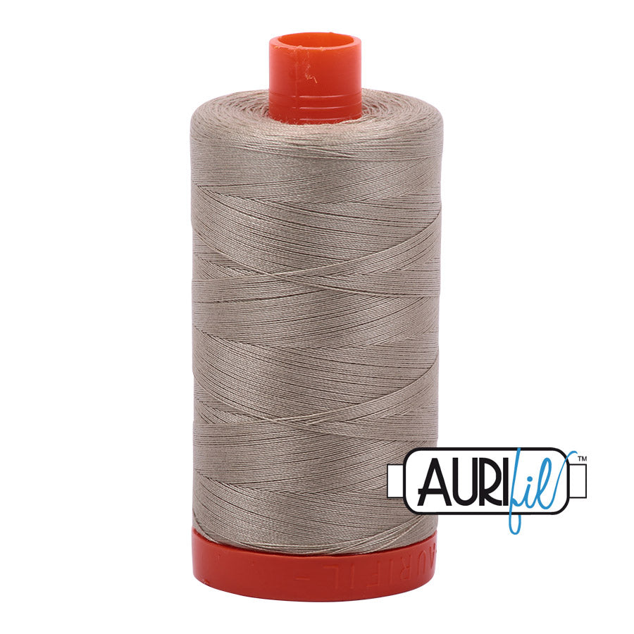 Aurifil 50 wt. cotton thread offers versatility, strength, and radiant color with very little lint on each 1,422 yard large spool.