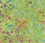Green batik fabric with multicolor circles and dots by Batik Textiles