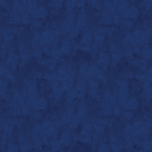 Chalk Texture 9488-57 is a navy blue cotton fabric with a mottled tone on tone texture with lightly brushed markings.