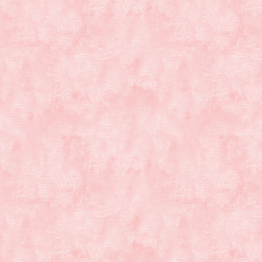 Chalk Texture 9488-22 is a light blush pink cotton fabric with a mottled tone on tone texture with lightly brushed markings.