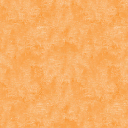 Chalk Texture 9488-37 is a light orange cotton fabric with a mottled tone on tone texture with lightly brushed markings.