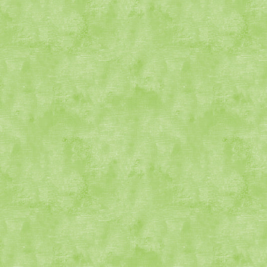 Chalk Texture 9488-48 is a light sage green cotton fabric with a mottled tone on tone texture with lightly brushed markings.