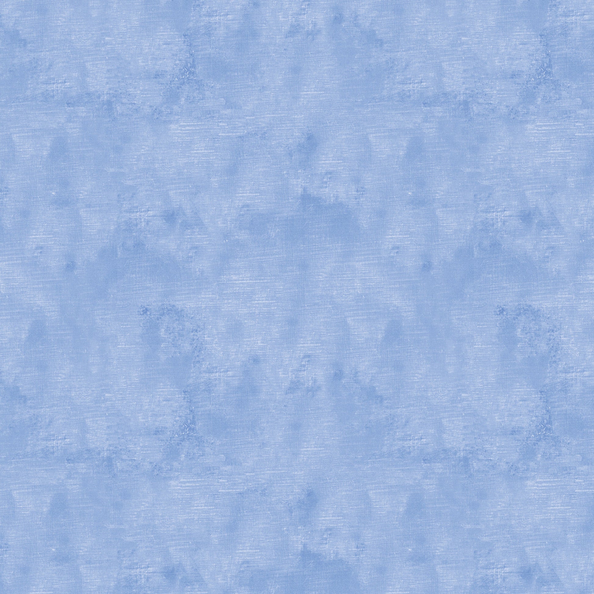 Chalk Texture 9488-53 is a light royal blue cotton fabric with a mottled tone on tone texture with lightly brushed markings.