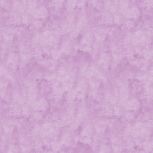Chalk Texture 9488-61 is a lilac purple cotton fabric with a mottled tone on tone texture with lightly brushed markings.