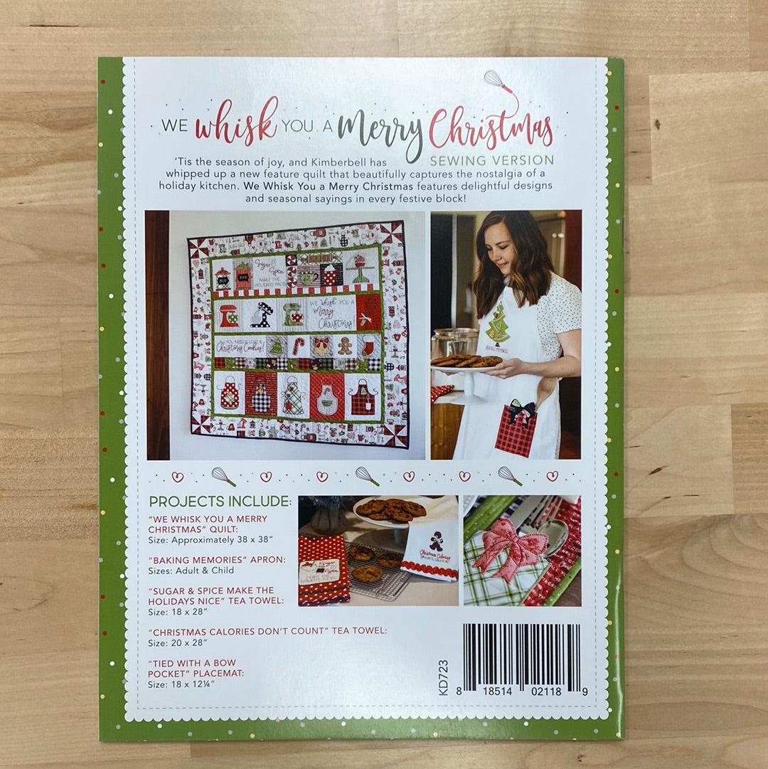 We “Whisk” You a Merry Christmas! (KD723) is Kimberbell’s feature quilt and holiday tribute to sweet Christmas confections and even sweeter traditions and memories. Dimensional elements include flexible foam whipped cream, marshmallow poms, a clear vinyl cake dome, applique glitter countertop mixers, and more! Photo shows product back cover.