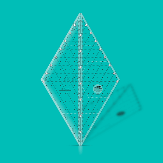 Creative Grids 60-degree diamond ruler on a teal background