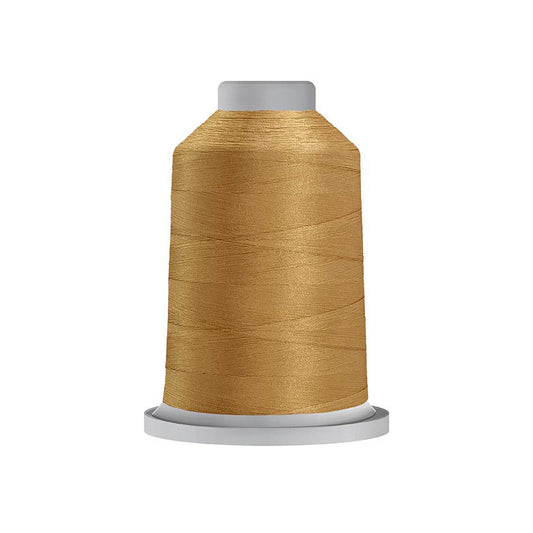 Glide thread spool in Military Gold, which is a light gold color with sheen