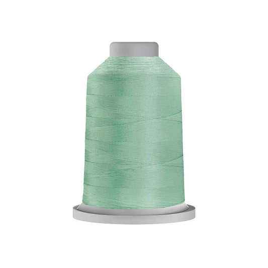 Glide trilobal polyester 40 wt. thread in Magic Mint - -30317; Photo shows mint green spool of thread.