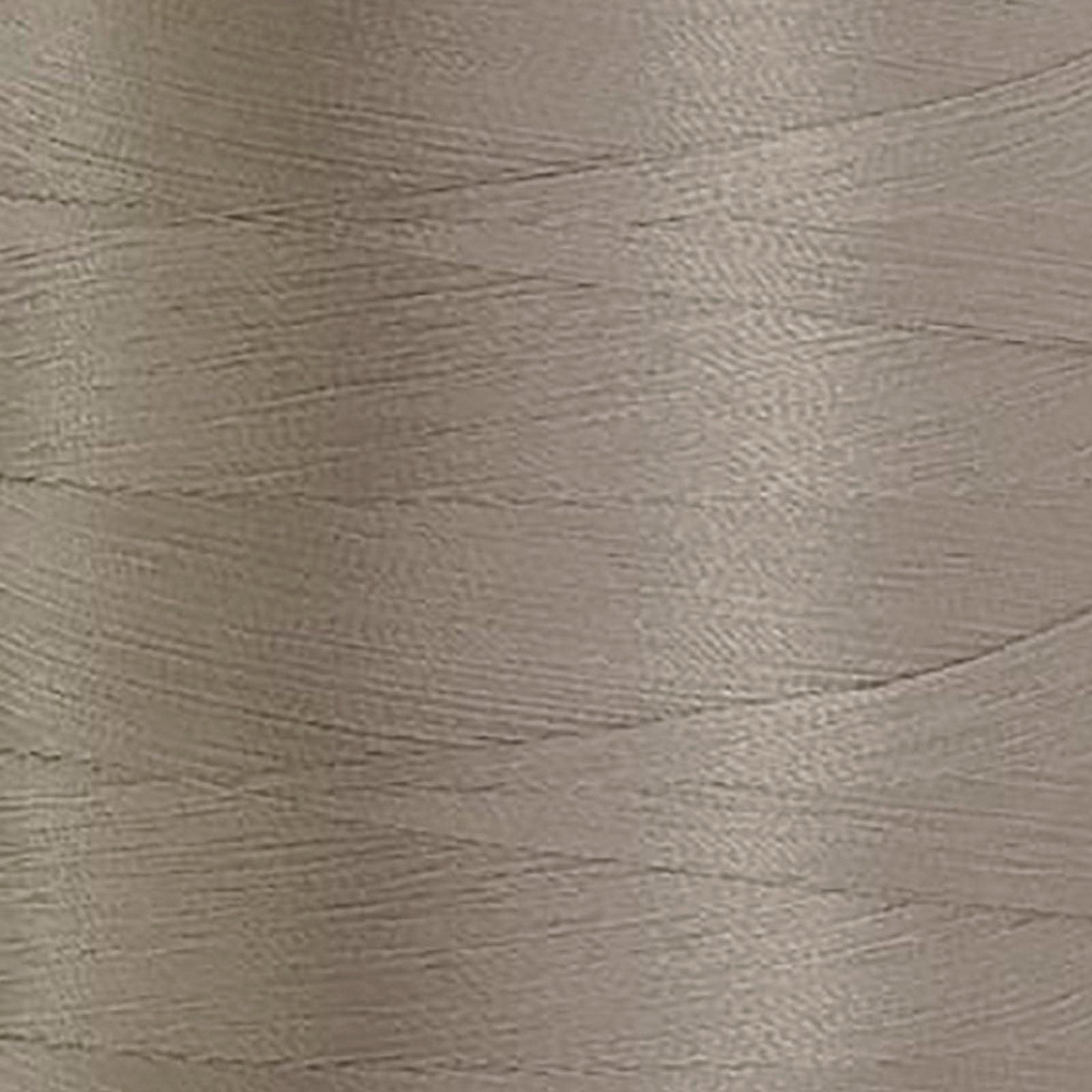 Glide 40 wt. Trilobal Polyester by Fil-Tec come in a mini spool of 1,100 yards of thread. Cool Grey 3 (10CG3) is a medium shade grey, perfect for woodland creature or construction embroidery and thread-painting. Photo shows the closeup of the thread.  Stitcher's Joy