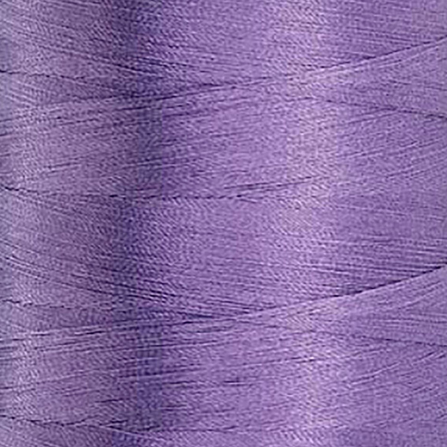 Glide 40 wt. Trilobal polyester thread by Fil-Tec offers superior coverage in each 1,100 yard mini spool. Lilac (42655) is a universal purple in a pale shade. The photo shows the thread detail. Stitcher's Joy