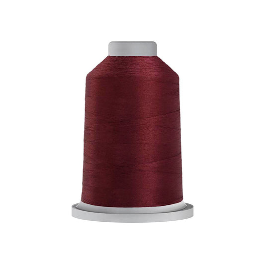 Glide 40 wt. Trilobal polyester thread by Fil-Tec offers superior coverage in each 1,100 yard mini spool. Maroon (70209) is a rich maroon. Stitcher's Joy