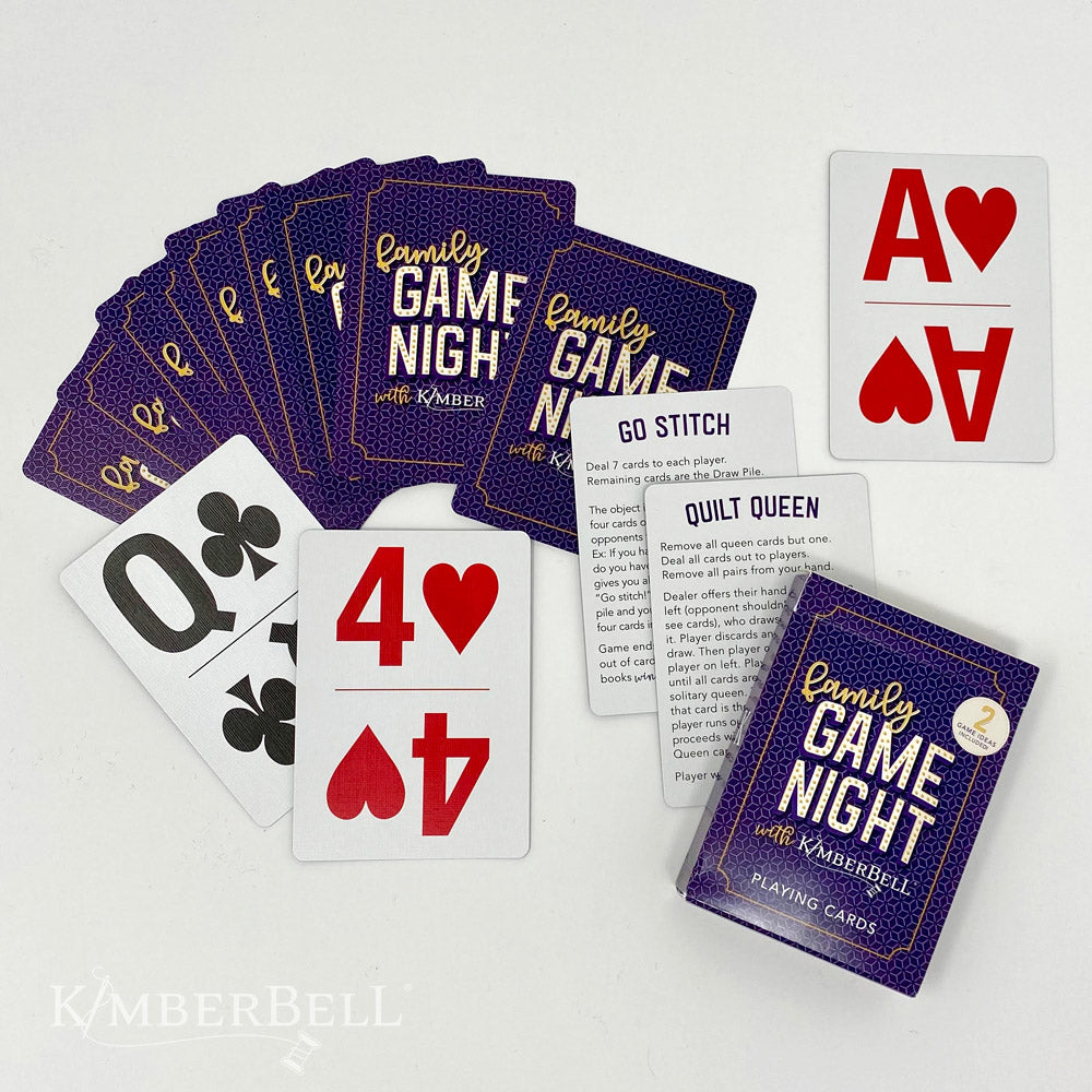 Family Game Night Playing Cards (KDMR108) by Kimberbell. In this family friendly deck of playing cards, standard suits are represented with jumbo symbols and numbers, making the cards easy to read. Photo shows the front and back of the cards and the included Go Stitch and Quilt Queen game instruction cards.