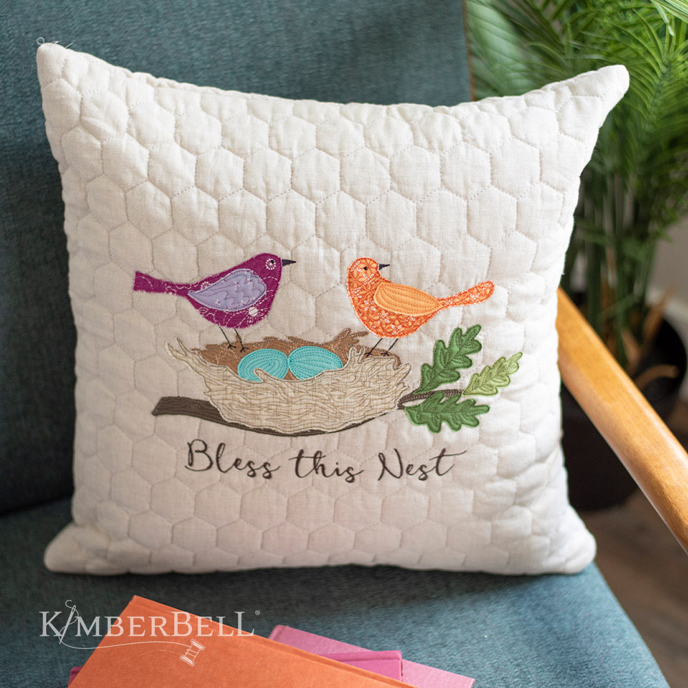 Create beautiful decor for your home with Kimberbell's Oat Linen 19" x19" hexagon quilted pillow blank (KDKB260)! Kimberbell’s Quilted Pillow Blanks are easy to embellish with serged, open side seams and a sewn-in zipper. Photo shows finished pillow with bird and nest embroidery design.