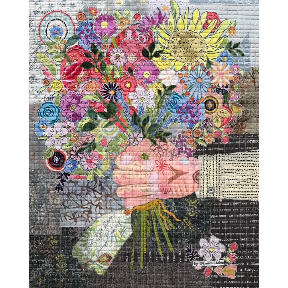 Celebrate the beauty of flowers with this gorgeous, collage-style pattern! Perfect for bringing a burst of springtime joy into any space, this stunning design features a vibrant floral bouquet for a cheery yet sophisticated feel. The photo shows the finished project.
