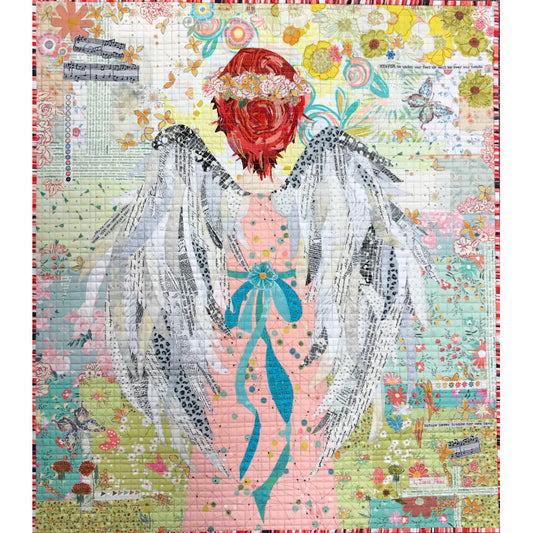 The Noel Collage Pattern by Laura Heine is a unique pattern that utilizes collage techniques to create a stunning angel design. The photo is of the completed quilt.