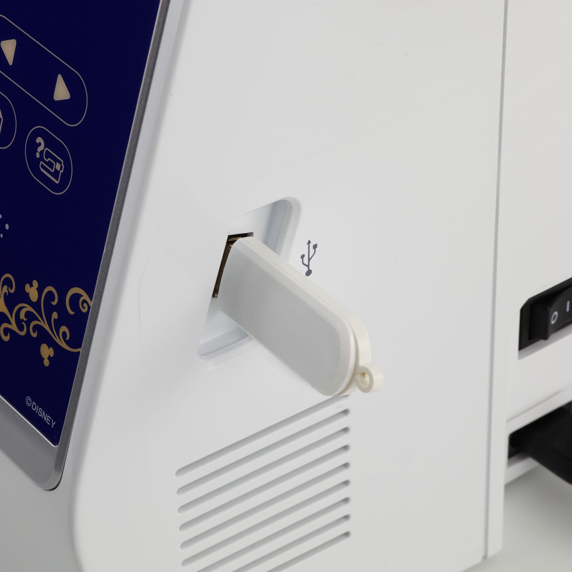 Closeup of the USB-C port on the Brother NS1750D convertible sewing and machine embroidery machine.