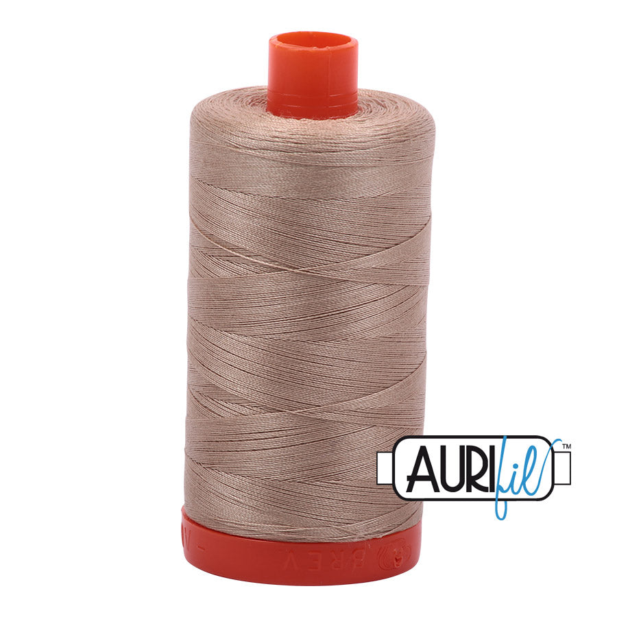 Aurifil 50 wt. cotton thread offers versatility, strength, and radiant color with very little lint on each 1,422 yard large spool. Sand (2326) is a medium to dark shade of beige with brown to rose undertones, and is the most popular choice when a medium beige is needed. Stitcher's Joy