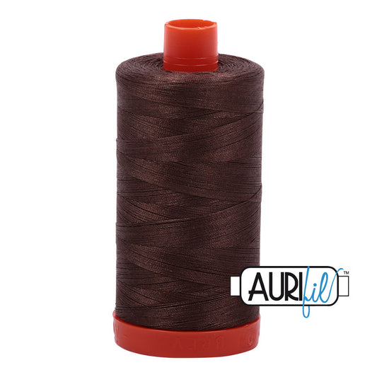 Aurifil 50 wt. cotton thread offers versatility, strength, and radiant color with very little lint on each 1,422 yard large spool. Bark (1140) is a medium brown. Stitcher's Joy