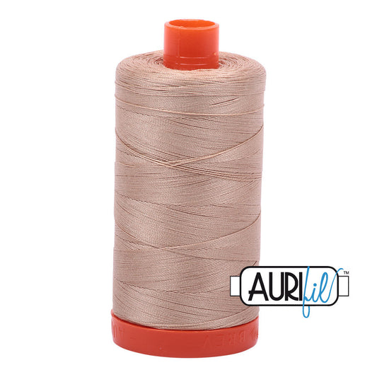 Aurifil 50 wt. cotton thread offers versatility, strength, and radiant color with very little lint on each 1,422 yard large spool. Beige (2314) is a dark cream to light tan with brown undertones. Stitcher's Joy