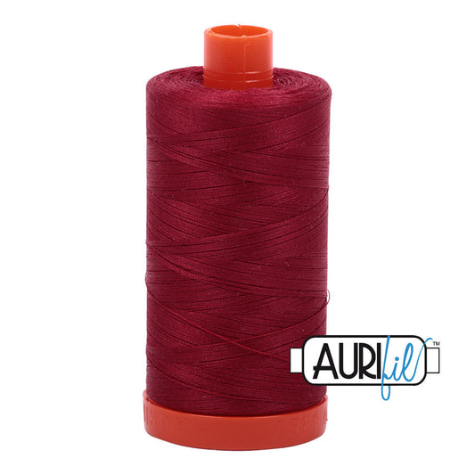 Aurifil 50 wt. cotton thread offers versatility, strength, and radiant color with very little lint on each 1,422 yard large spool. Burgundy (1103) is a medium to dark red with a slight berry hue. Stitcher's Joy