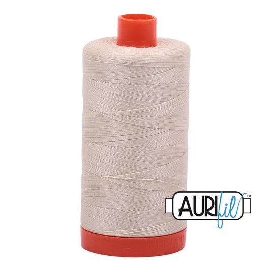 Aurifil 50 wt. cotton thread offers versatility, strength, and radiant color with very little lint on each 1,422 yard large spool. Light Beige (2310) is a light to medium shade of true tan with yellow to brown undertones. Stitcher's Joy