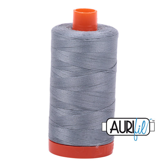 Aurifil 50 wt. cotton thread offers versatility, strength, and radiant color with very little lint on each 1,422 yard large spool. Light Blue Grey (2610) is a medium shade of grey with blue undertones. Stitcher's Joy