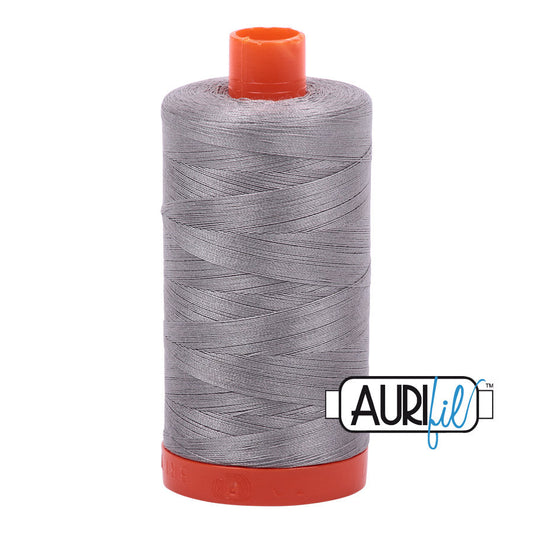 Aurifil 50 wt. cotton thread offers versatility, strength, and radiant color with very little lint on each 1,422 yard large spool. Stainless Steel (2620) is a medium to dark gray, and is the most popular choice when a medium gray is needed. Stitcher's Joy