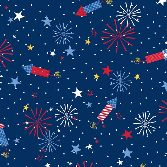 Fireworks on Navy Blue features rockets, fireworks and stars on a background of navy blue. It has a multi-directional layout so it can be used as a non-directional fabric. The fabric is from the Red, White & Bloom collection by Kim Christopherson of Kimberbell for Maywood Studio and features everything to love about summer.
