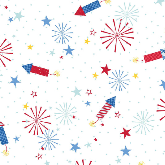 Fireworks on White features rockets, fireworks and stars on a background of white. It has a multi-directional layout so it can be used as a non-directional fabric. The fabric is from the Red, White & Bloom collection by Kim Christopherson of Kimberbell for Maywood Studio.