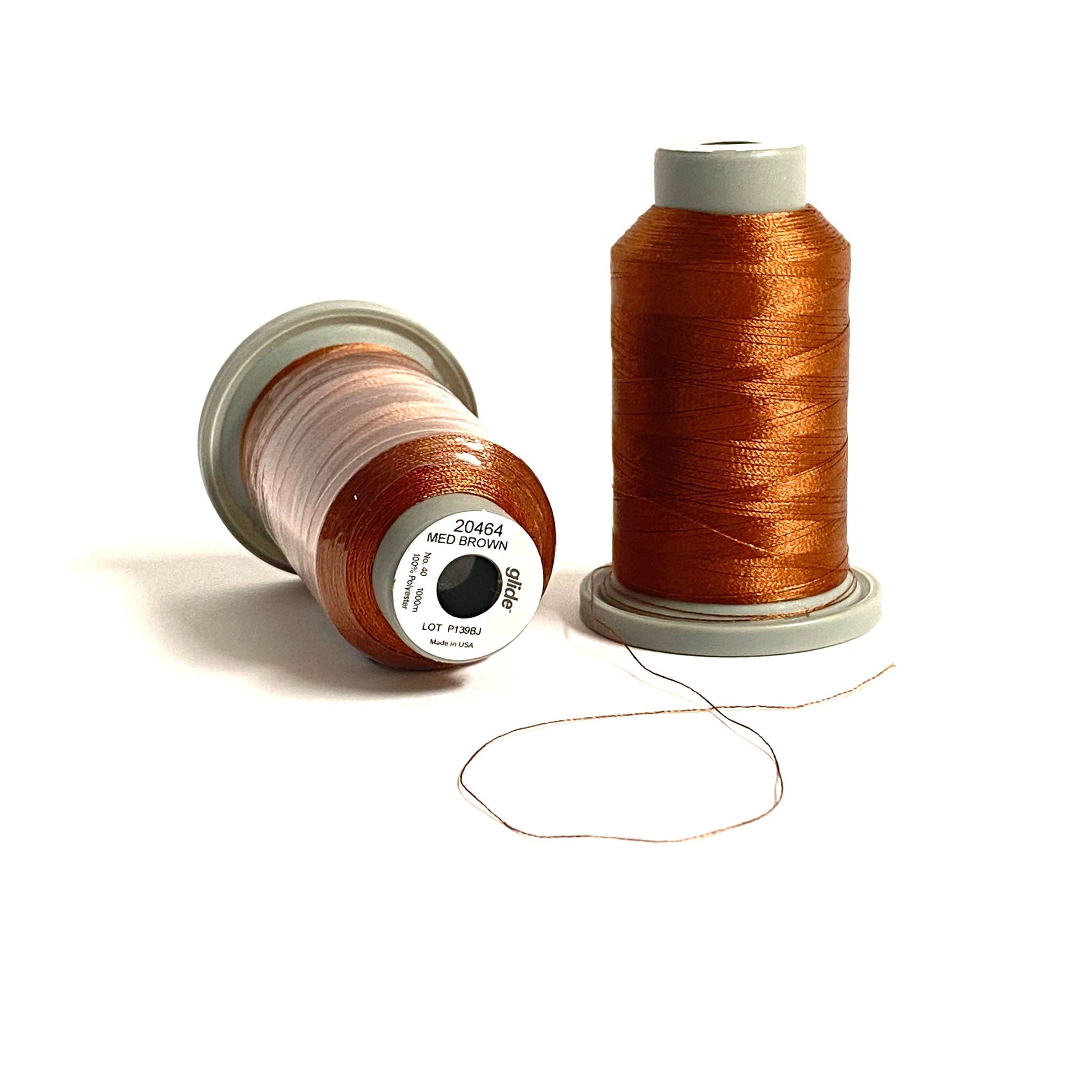 Glide 40 wt Trilobal Polyester by Fil-Tec in Medium Brown (20464) is a rich brown, perfect for thread-painting and embroidery of branches and woodland animals. Stitcher's Joy