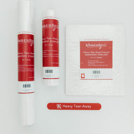 The Heavy Tear Away stabilizer by Kimberbell is color-coded in a dark red to reflect that this tear away will tear away neatly and cleanly with high stitch count designs. Each of the three sizes: 12" x 10 yard, 20" x 10 yard, and 10" x 12" sheets are shown with the coordinating slap band in dark red to keep the stabilizers organized and identifiable.